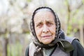 Worried old lady with headscarf Royalty Free Stock Photo