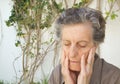 A worried old woman. Close up Royalty Free Stock Photo