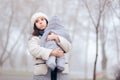 Worried Overprotective Mother Holding baby in Cold Weather Royalty Free Stock Photo