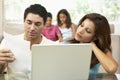 Worried Parents Using Laptop At Home Royalty Free Stock Photo