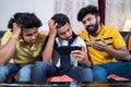 Worried people due to slow internet connection or speed while wathching live streaming movie or sports match from mobile phone at