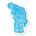 worried quirky cartoon distressed sticker of a boy wearing santa hat