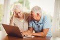 Worried senior couple using laptop Royalty Free Stock Photo