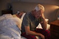 Worried Senior Man In Bed At Night Suffering With Insomnia Royalty Free Stock Photo