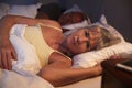 Worried Senior Woman In Bed At Night Suffering With Insomnia Royalty Free Stock Photo