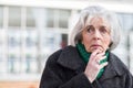 Worried Senior Woman Looking Lost Outdoors Royalty Free Stock Photo