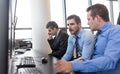 Worried stock traders brainstorming in corporate office. Royalty Free Stock Photo