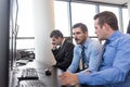 Worried stock traders brainstorming in corporate office. Royalty Free Stock Photo