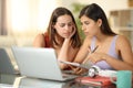 Worried students studying online at home Royalty Free Stock Photo