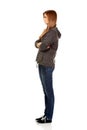 Worried teenage woman with folded arms Royalty Free Stock Photo