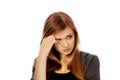 Worried teenage woman with folded arms Royalty Free Stock Photo