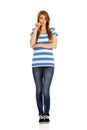 Worried teenage woman with folded arms Royalty Free Stock Photo