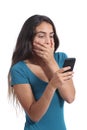 Worried teenager girl looking at smart phone Royalty Free Stock Photo