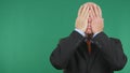 Worried and Upset Businessman Covering His Face With Hands Royalty Free Stock Photo