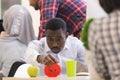 Worried young African man in formalwear checking time while look Royalty Free Stock Photo