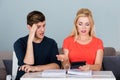 Worried Young Couple Calculating Their Bills Royalty Free Stock Photo