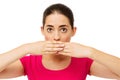 Worried Young Woman Covering Mouth With Hands Royalty Free Stock Photo