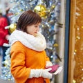 Worried young woman holding purse with Russian roubles Royalty Free Stock Photo