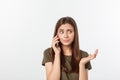 Worried young woman looks nervously, Female is nervous while talking on the phone, feels frustrated and worrying phone