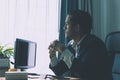 Worrired Business man looking out the windows frustrating Royalty Free Stock Photo