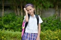 Worrisome Girl Student Wearing School Uniform With Books