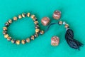 Worry beads and three dices with various points