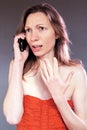 Frustrated woman phone call Isolated classy beautiful young in party dress