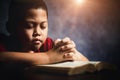 Worship christian with bible concept. Young boy person hand holding holy bible with study at home. Adult female christian reading Royalty Free Stock Photo