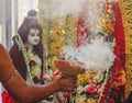 Worship of indian god godess idol dhoop dhuno dhunichi durga puja with narkel chobra indian culture Royalty Free Stock Photo