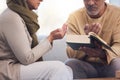 Worship, prayer and Muslim couple with a quran, reading and studying spiritual faith in their house. Religion, gratitude Royalty Free Stock Photo