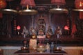 A worship room that has Chinese Gods statues with red incense burned Royalty Free Stock Photo