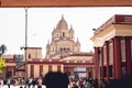 Worshipers in front of the Hindu Dakshineswar Kali Temple on a sunny day in Kolkata, India