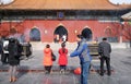 Worshipers holding incense sticks pray at Yonghegong Lama Temple in Beijing Royalty Free Stock Photo