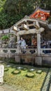 Worshipers wash their hands at a Temple in Kyoto Japan