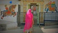 Worshipper entering a Hindu temple in Udaipur, India