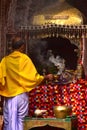 Worshipper in front of temple praying background photograph