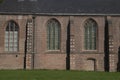 Woudrichem, The Netherlands. St. Martinus Church in the old historical fortified city seen from the village, typical Dutch scenery Royalty Free Stock Photo