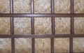 Woven bamboo ceiling with wood straps texture Royalty Free Stock Photo