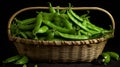 Woven basket filled with crisp, green sugar snap peas