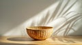 Woven Basket on Wooden Table in Sunlit Room. Generative ai Royalty Free Stock Photo