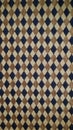 Woven diamond pattern fabric texture in blue and brown colors Royalty Free Stock Photo