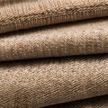 668 Woven Fabric Texture: A textured and versatile background featuring a woven fabric texture in warm and natural tones that cr Royalty Free Stock Photo