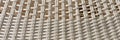 Woven panoramic light background. Simple background of bright ropes