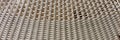 Woven panoramic light background. Simple background of bright ropes