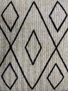 Woven raffia texture. Trendy abstract geometric pattern with triangles. Ethnic raffia background with spun rhombus shaped Royalty Free Stock Photo