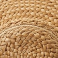 Woven straw texture featuring interlaced natural fibers creating a circular Royalty Free Stock Photo