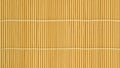 Woven texture of light brown bamboo sticks with a vertical arrangement Royalty Free Stock Photo