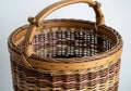 Woven wicker basket with handle isolated on white background Royalty Free Stock Photo