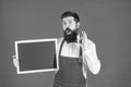 Wow. Bearded man show OK holding blackboard. School enrolment. Chalkboard for enrolment information
