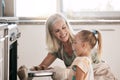 Wow child, girl or oven baking grandparent, senior or elderly woman in kitchen, bonding house or family home. Happy Royalty Free Stock Photo